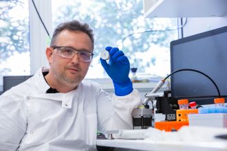 Dr Muller holding patch