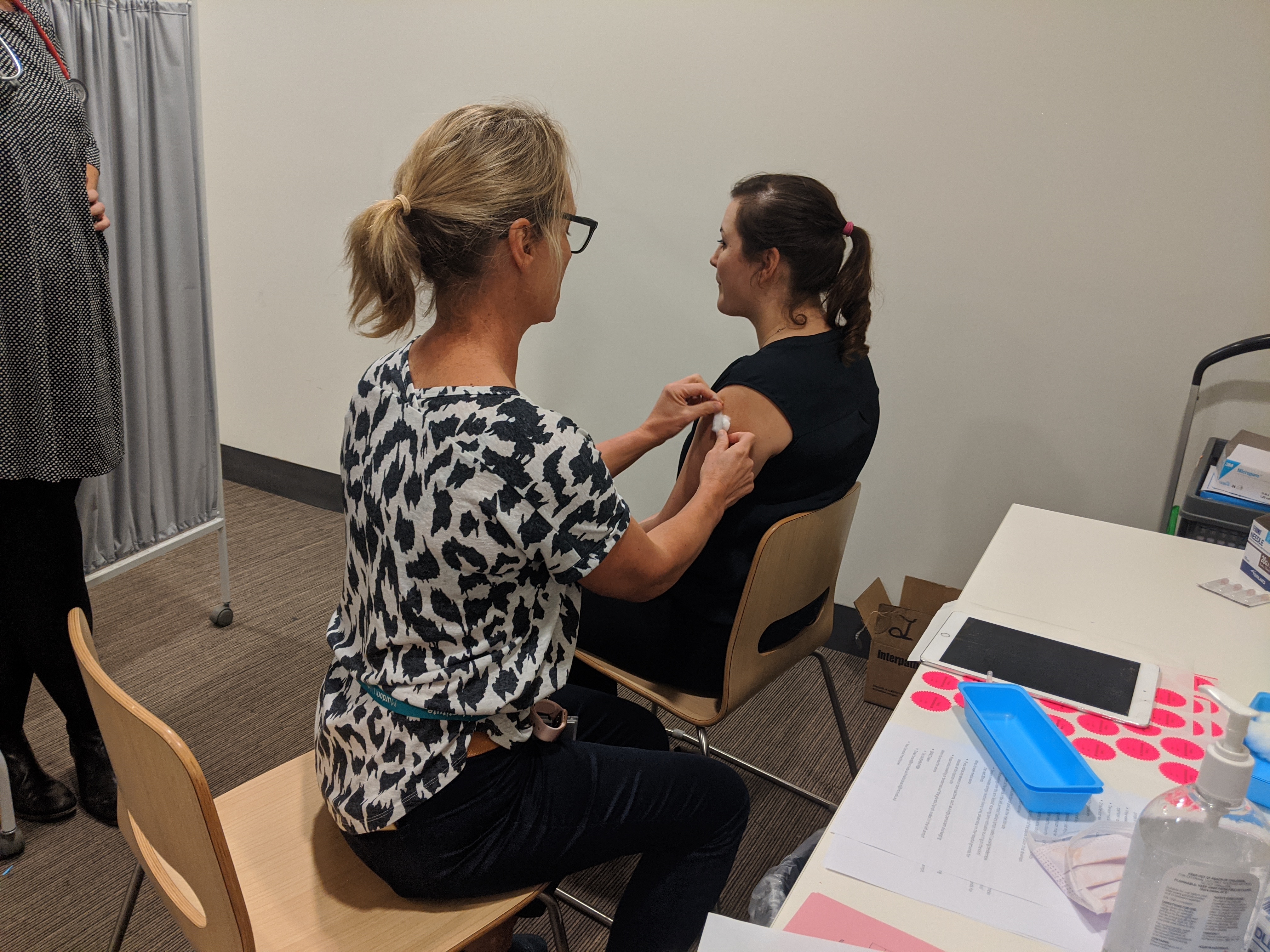 MCRI nurse Kate Wall giving the BCG vaccine to a MCRI healthcare worker