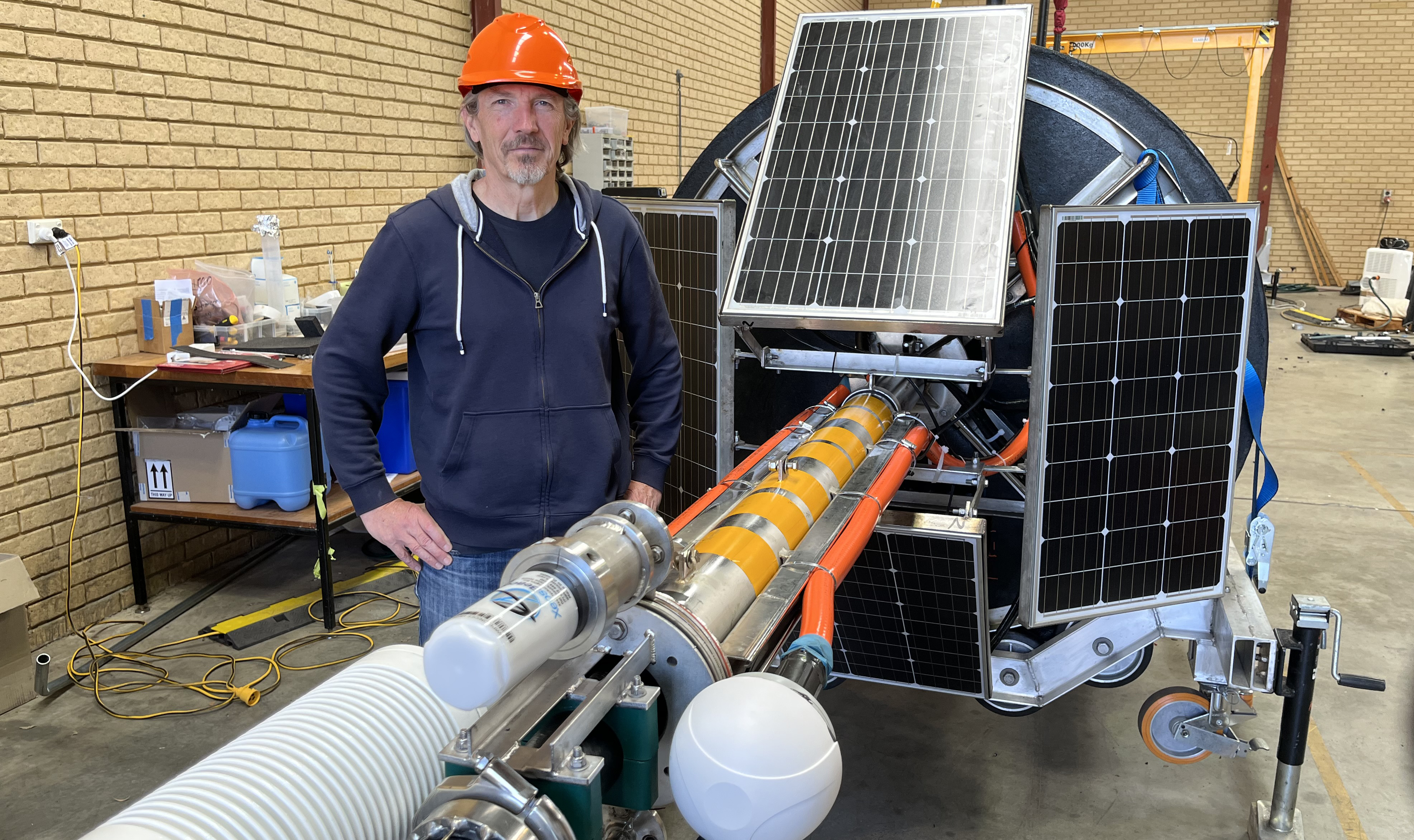 The MarONet buoy and Professor David Antoine. Picture: Curtin University