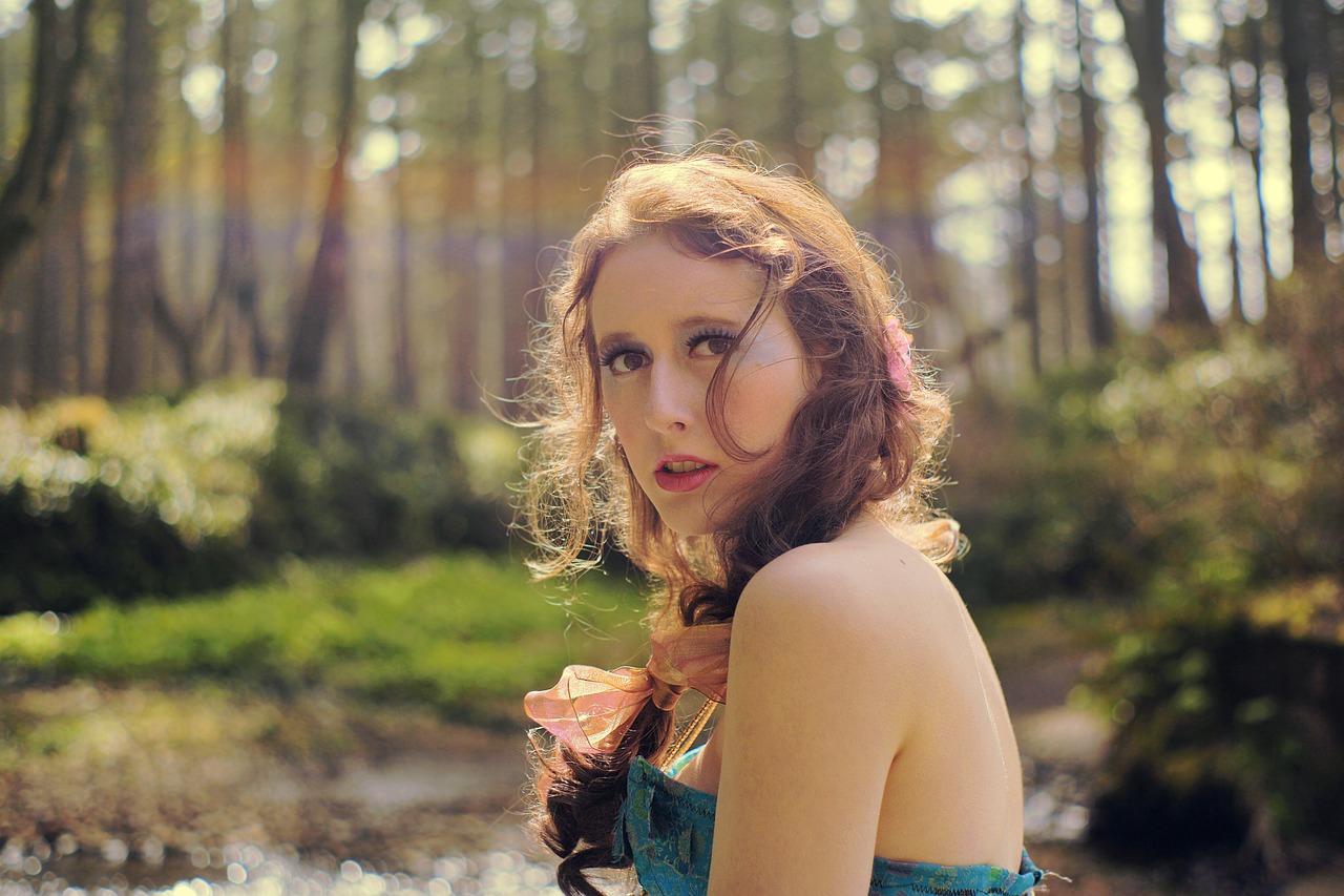 CC-0.https://pixabay.com/photos/girl-woman-forest-river-peering-4342895/