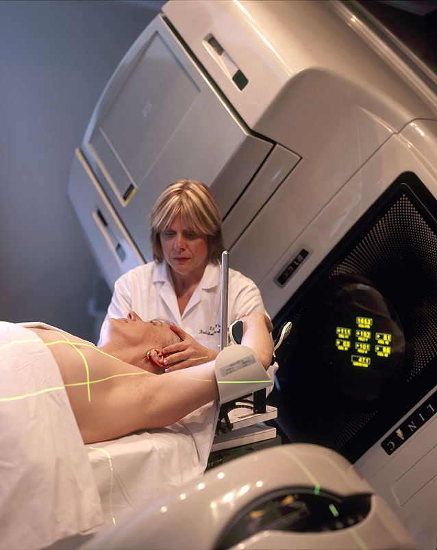 National Cancer Institute/ Woman being prepared for radiation therapy