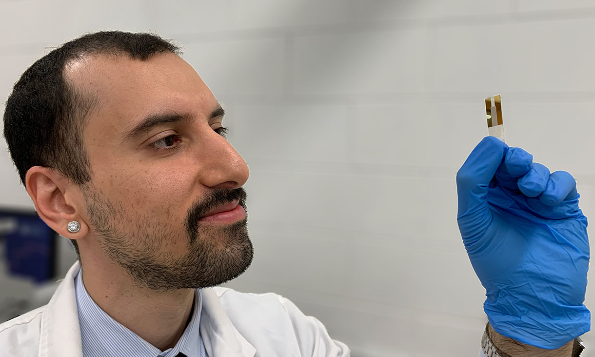 Co-lead author Mr Hossein Alijani, a PhD candidate, with the rust-busting acoustic device. Credit: RMIT University 