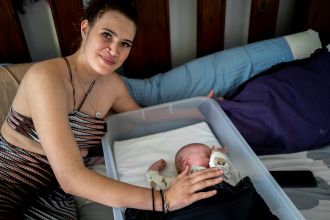 Young mum with baby participating in Pepi-pod program