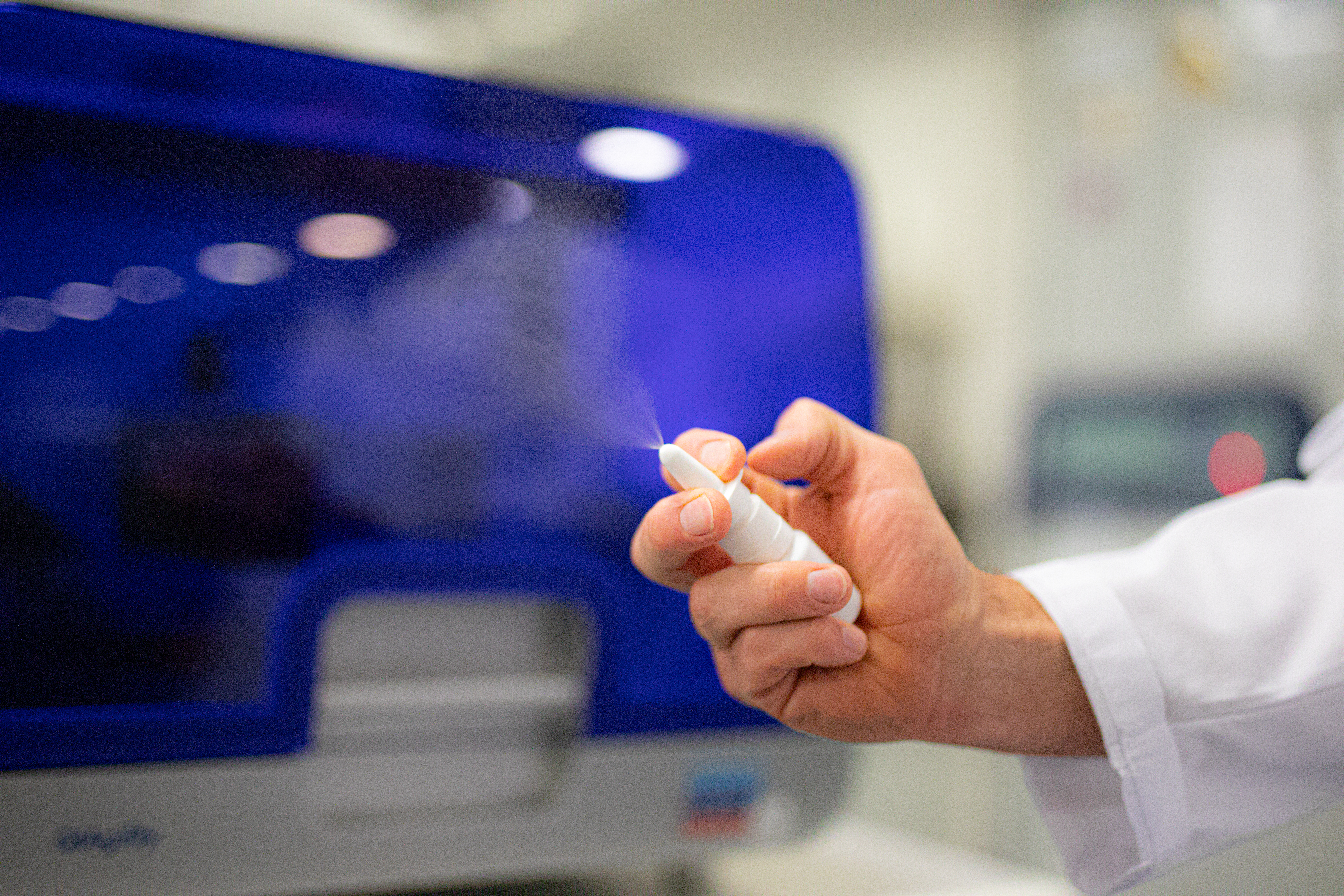 Associate Professor Nathan Bartlett with nasal spray. Credit: Hunter Medical Research Institute
