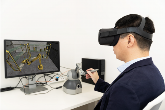 Dr Hou using "Tactile Internet"