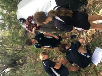 Waikerie Primary School students setting up their Malaise insect trap.