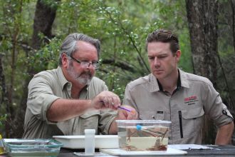 David Moffatt and Dr Luke Carpenter-Bundhoo take measurements of lamprey.