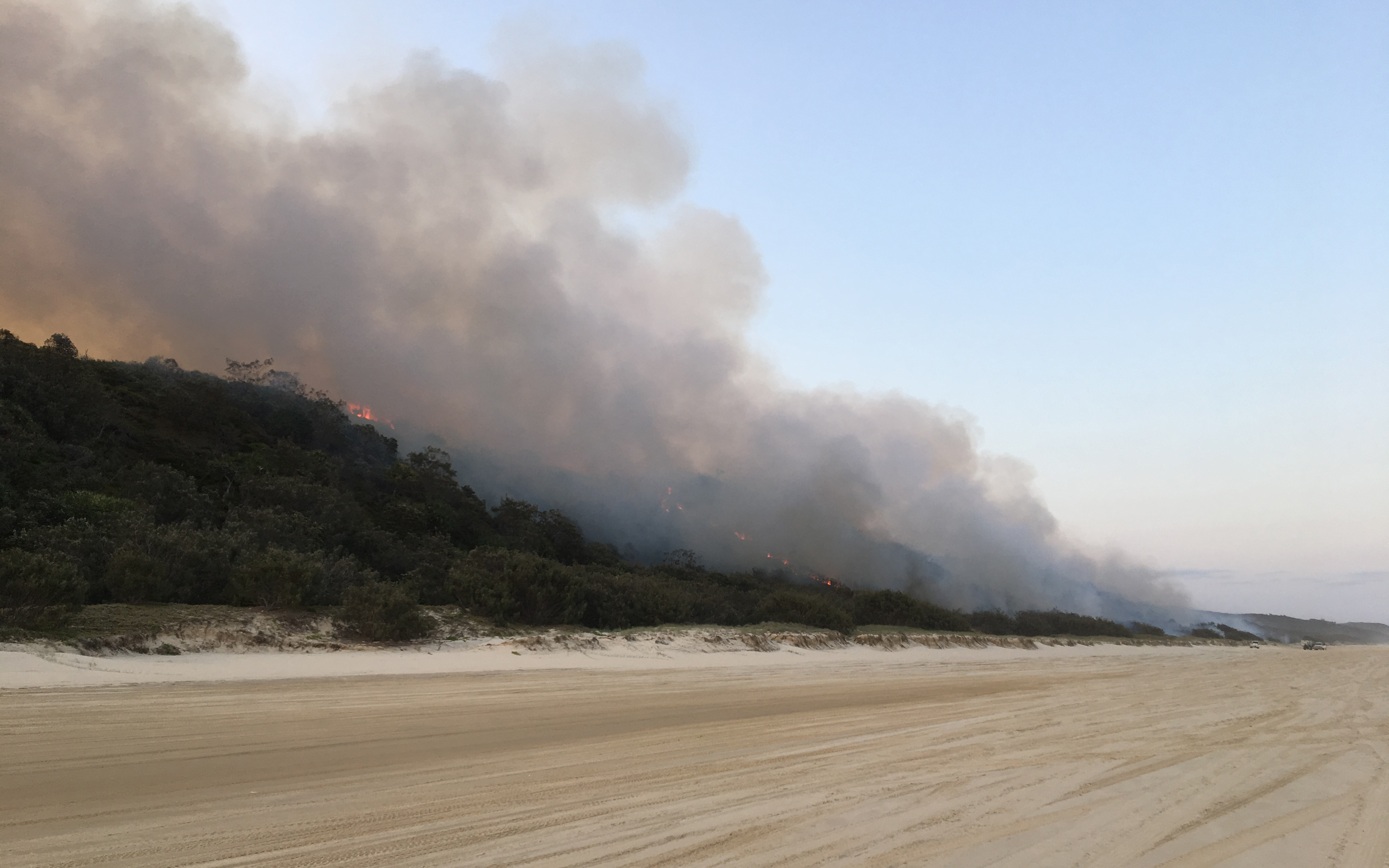 Fraser Island Fire on K’gari in 2020 which burned over 50% of the island. Image: Queensland Fire and Emergency Services
