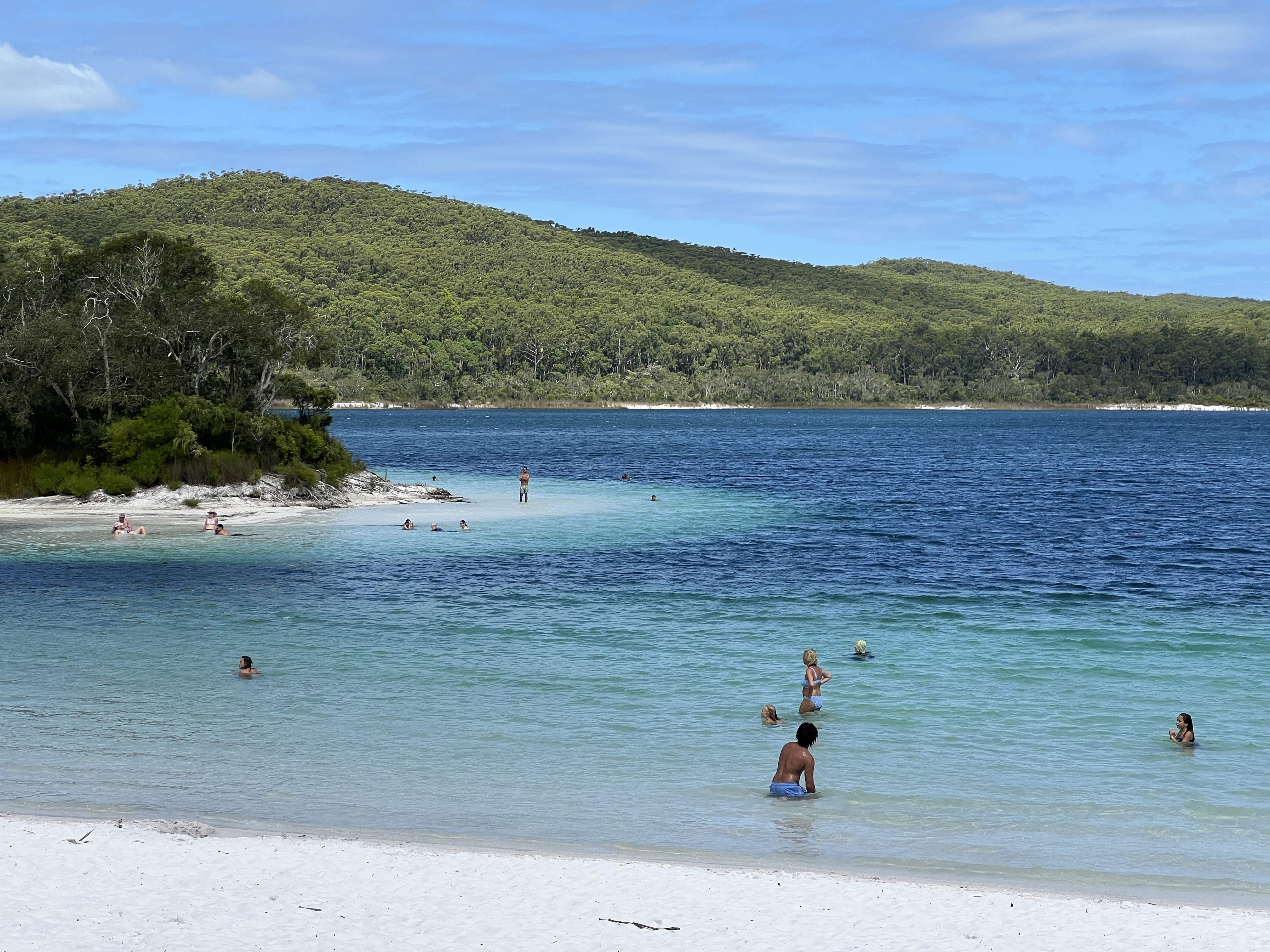 People enjoying a lake in K'gari National Park in Queensland. Image: Jaana Dielenberg