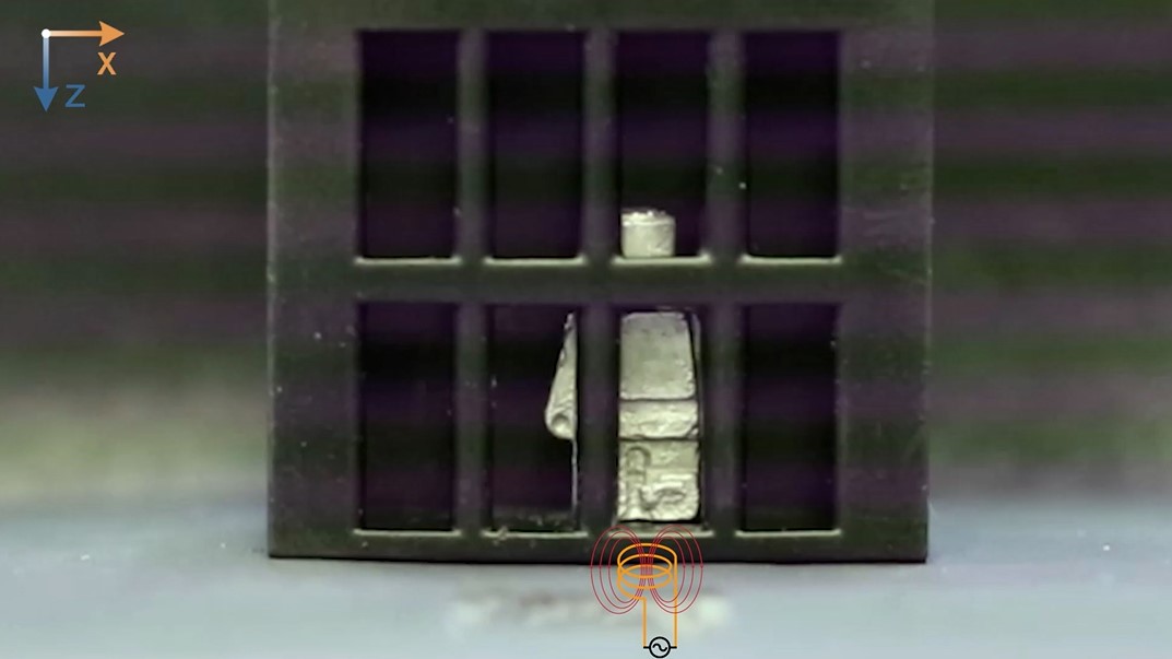 Person-shaped robot liquifies to escape cage. CREDIT: Wang and Pan, et al.