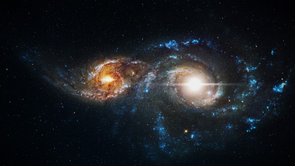 The new algorithm is inspired by gravitational interactions when galaxies merge. Adobe Stock by alones.