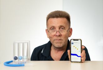 Clarence Baxter with the app