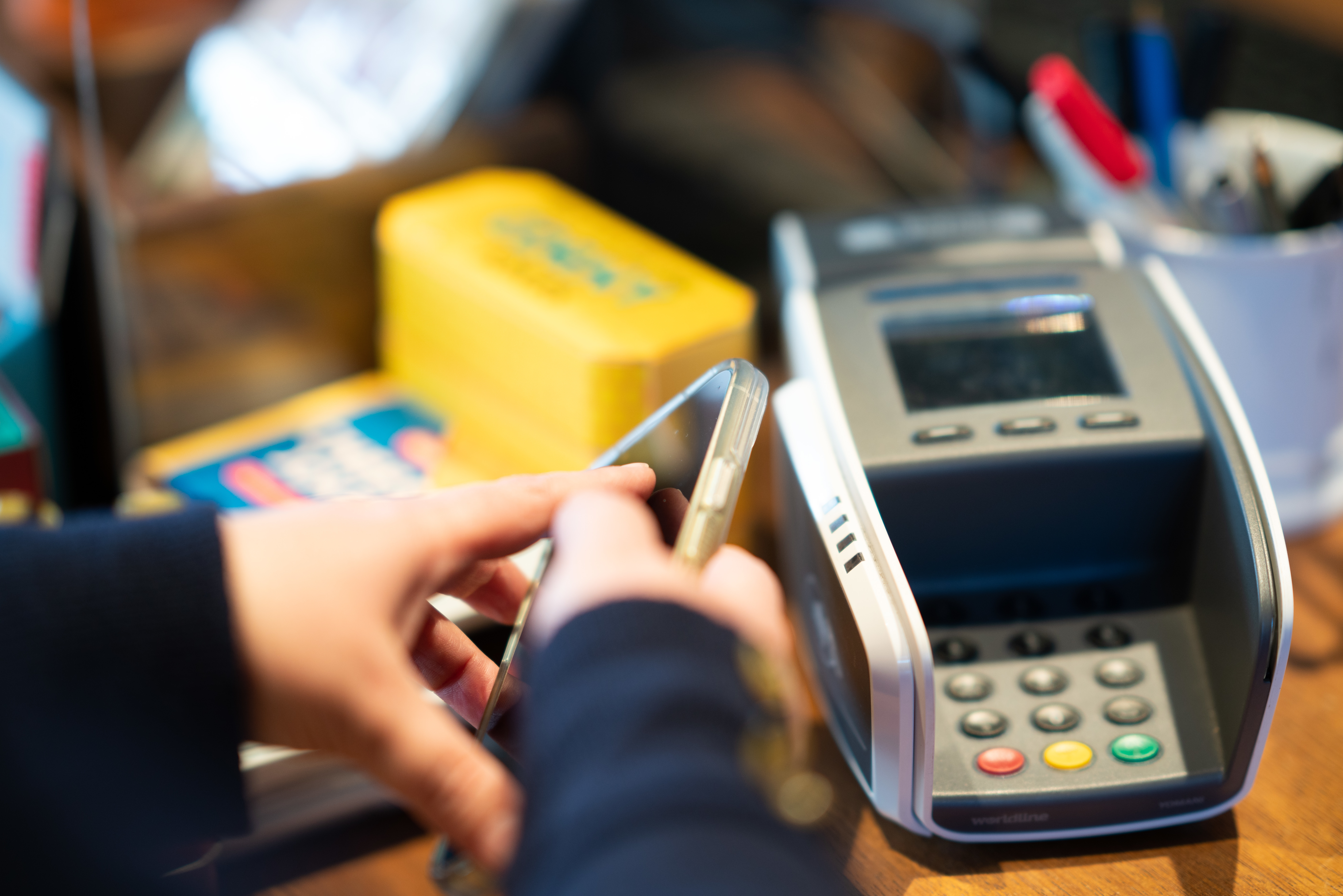Paying at eftpos machine Photo: Tracey Nearmy/ANU