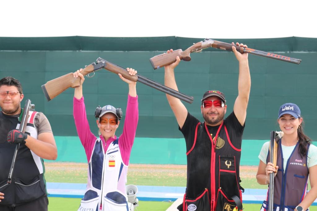 Mixed trap event gold medallists of the Tokyo 2020 Olympics. Credit: Alberto Fernandez, CC-BY 4.0 (https://creativecommons.org/licenses/by/4.0/)
